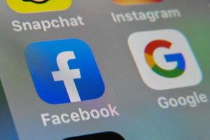 Australia to force Google, Facebook to pay domestic media to use content